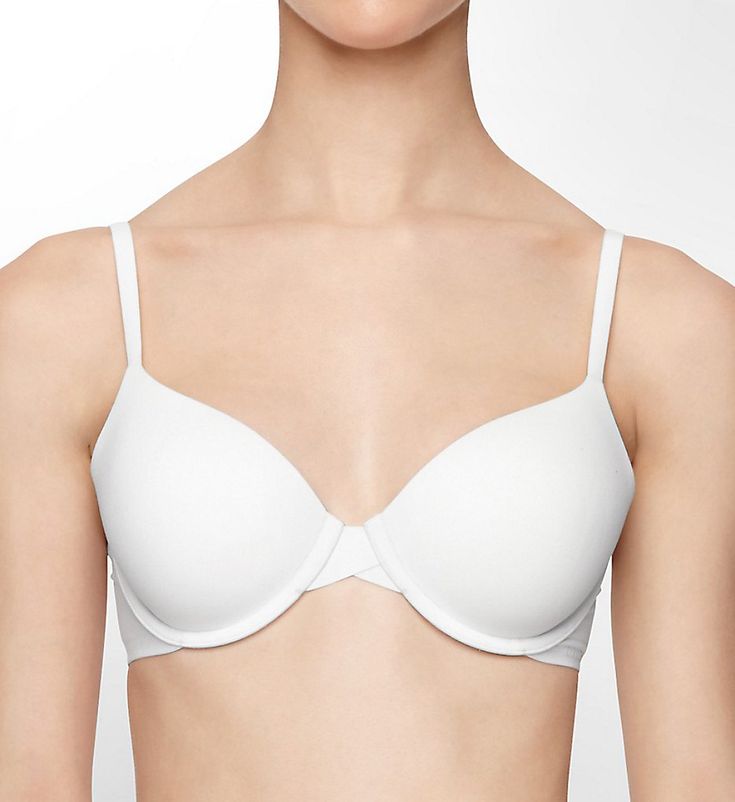 Look sleek under all your fine knits in this contour underwire bra with a silky-smooth nylon/spandex microfiber body. Contour/t-shirt bra with light padding has supportive underwires to lift and round. Flexible, stretch cup is padded and has a silky microfiber overlay. Fused, stretch top cup edge gives a more custom fit. Bandless front is less bulky for petites and women with short torsos. Center panel - arched for high tummies, low for plunge necklines. Seamless, lined sides and back have turne Bra With Removable Pads And Minimal Stretch, Classic Push-up Bra, Classic Seamless Solid Bra, Classic Seamless Solid Color Bra, Classic Seamless Bra, Classic Padded Solid Bra, Classic Padded Solid Color Bra, Classic Full Coverage Stretch Bra, Classic Fitted Bra With Built-in Support