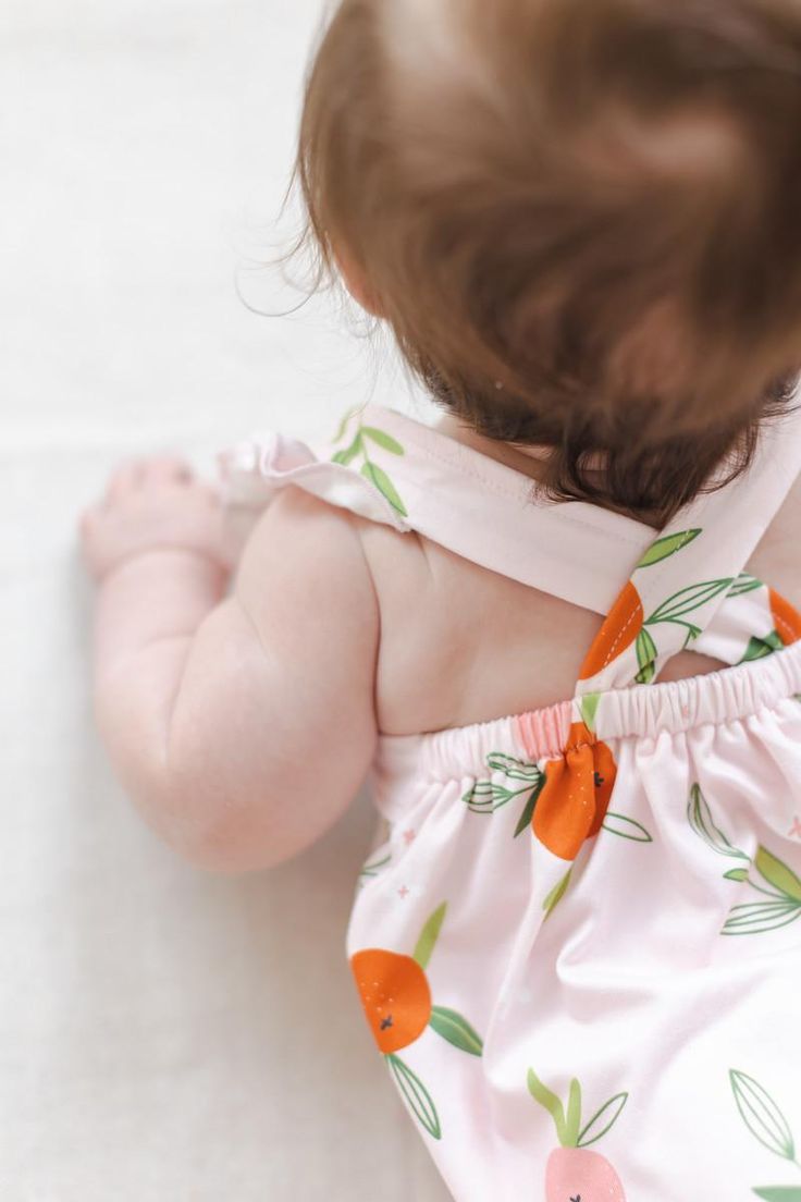 Our Ruffle Cross Back Romper is perfect for summer! Straps criss cross in the back with a sweet ruffle on the shoulder. Snaps for easy diaper changes. Also available in a matching dress! Perfect for big sister, cousin or BFF. Super soft fabric stays bright wash after wash. INSTRUCTIONS: Wear-Crawl-Repeat FIT & FABRIC & CARE: True to Size Polyester/Spandex Blend Machine Wash /Tumble Dry Low Mila Rose, Toddler Flower Girls, Girls Gloves, Girls Dress Outfits, Toddler Flower Girl Dresses, Childrens Clothing Boutique, Infant Flower Girl Dress, Tea Party Dress