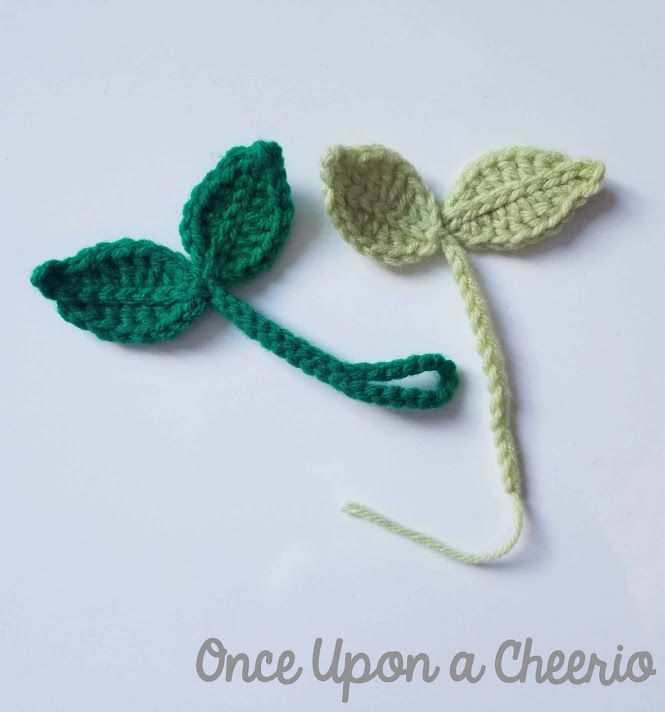 a crocheted flower is shown on a white surface with the words once upon a cherub written below it