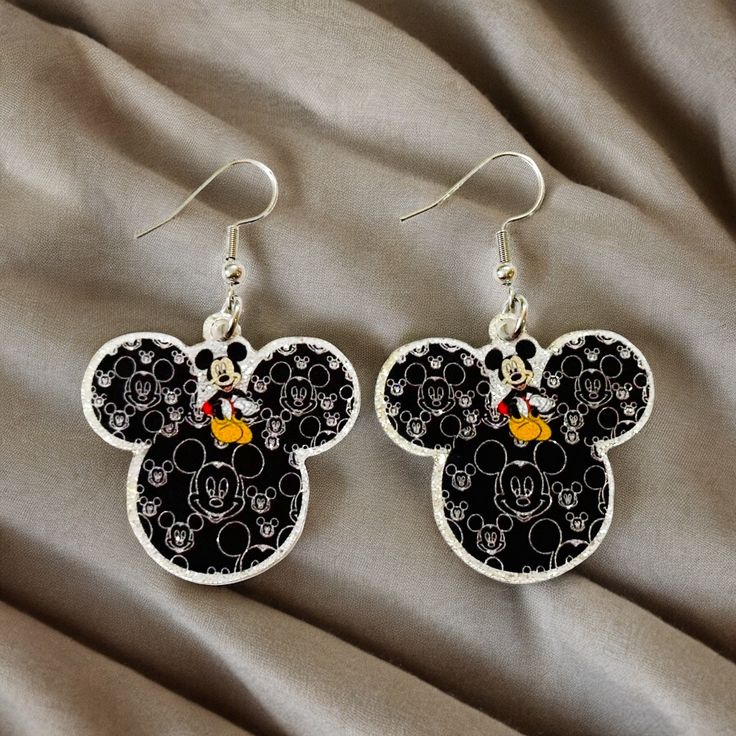 These earrings are made with stainless steel ear wires and lightweight acrylic.  The charms are 1 3/8 inches in size. If you order two or more items use the promo code twocool to get $2 off your order! Free Standard Shipping! Black Plastic Jewelry Gift, Nickel-free Plastic Earrings As Gift, Fun Black Hypoallergenic Earrings, Black Hypoallergenic Fun Earrings, Glitter Earrings, Code Promo, Ear Wires, Favorite Jewelry, Jewelry Earrings Dangle