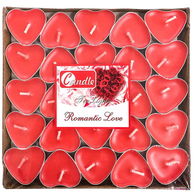 candles are arranged in a heart shaped box for valentine's day or other special occasion