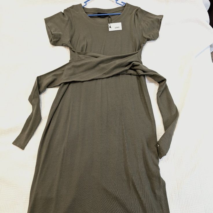 New With Tags, Never Worn Hatch Maternity Dress. Jersey Material, Olive Green Color. Size 1. Smoke Free Home. Fitted Green Maternity Dress With Short Sleeves, Olive Fitted Maxi Dress, Fitted Tie-back Maxi Dress For Daywear, Fitted Tie Back Maxi Dress For Daywear, Spring Maternity Wear Dresses Fitted, Fitted Green Maxi Dress For Maternity Wear, Fitted Summer Maternity Maxi Dress, Fitted Belted Maxi Dress For Daywear, Fitted Maternity Maxi Dress For Summer