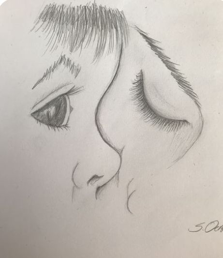 a pencil drawing of a child's face