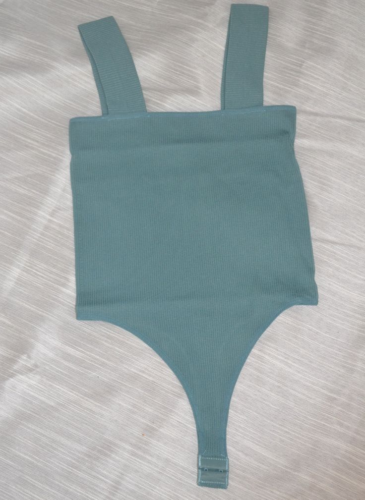 Basic sleeveless bodysuits. Material & Care - 92% Nylon - 8% Spandex - Hand Wash Cold & Dry Flat Available in Onesize Colors: White / Dusty Rose / Tan / Mauve / Teal Green Stretch Bodysuit, Solid Sleeveless Seamless Leotard, Sleeveless Solid Color Seamless Leotard, Seamless Sleeveless Solid Color Leotard, Stretch Bodysuit With Scoop Neck In Solid Color, Stretch Scoop Neck Bodysuit In Solid Color, Scoop Neck Stretch Bodysuit In Solid Color, Trendy Sleeveless Elastane Bodysuit, Casual Tank Bodysuit In Elastane