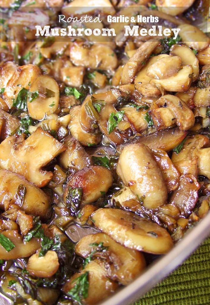 mushroom medley in a pan with herbs on top and the words roasted garlic to melt mushrooms