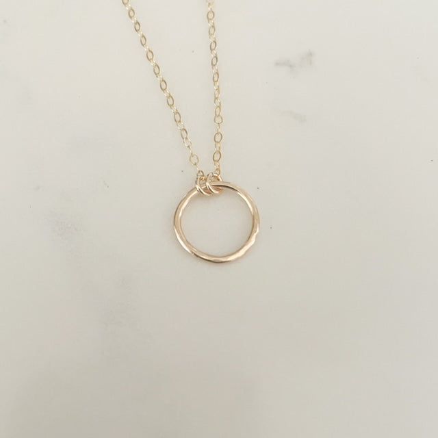 Your favorite new everyday necklace. The Full Circle necklace features a lightly hammered sterling silver or 14k gold fill circle suspended on an adjustable drop chain adored with delicate heart charm. Everyday Hypoallergenic 14k Gold-filled Charm Necklaces, Everyday 14k Gold-filled Round Disc Charm Necklaces, Minimalist Hammered 14k Gold Filled Necklaces, Everyday 14k Gold Filled Round Disc Charm Necklace, Everyday Yellow Gold Circle Charm Necklace, Minimalist Nickel Free 14k Gold Filled Charm Necklaces, Delicate Round Charm Necklace For Everyday, Everyday 14k Gold Filled Round Pendant Charm Necklace, Simple Adjustable Charm Necklace For Everyday