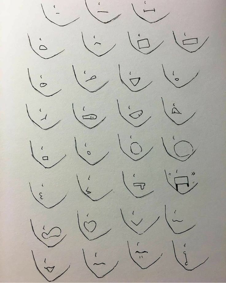 a drawing with many different faces drawn on it