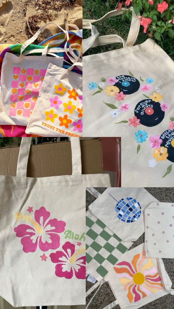 four different bags with designs on them sitting in front of some flowers and plants,