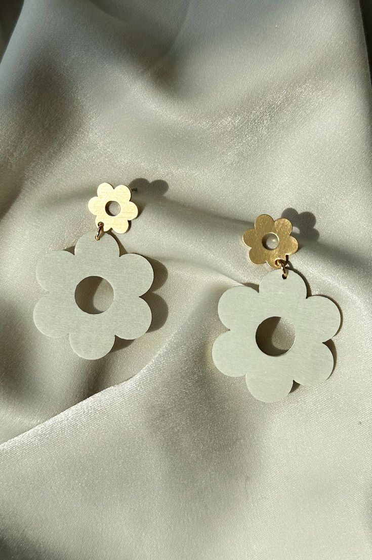 DESCRIPTION Flower shaped drop earring Post backing Gold accents Wood material Wood Earring, Earring Post, Wood Material, Wood Earrings, Drop Earring, Flower Shape, Gold Accents, Post Earrings, Drop Earrings