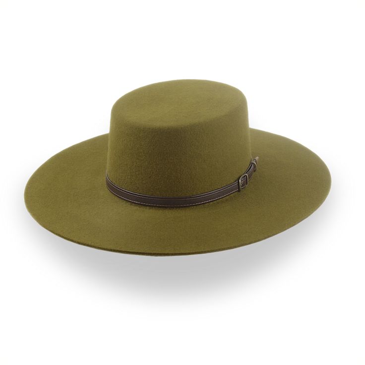 Description Materials Craftsmanship Hat Care Shipping Returns Product Description Modern Olive Green Flat Cowboy Hat for Stylish Adventurers Introducing the Galloper, a contemporary take on the classic cowboy hat that seamlessly blends Western charm with modern sophistication. Crafted from premium wool felt in a distinctive olive green, this flat-brimmed cowboy hat offers a refined finish and unparalleled comfort. Its unique design, featuring a sleek flat brim and customizable color combinations Mens Felt Hats, Spanish Hat, Homburg Hat, Outdoor Hut, Gambler Hat, Mens Hats Fashion, Fedora Hat Men, Homburg, Chapeau Cowboy