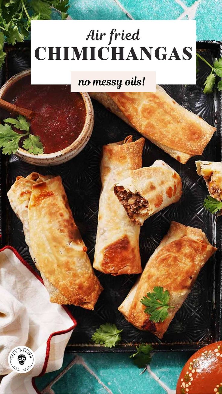 air fried chimichangas on a serving tray with dipping sauce