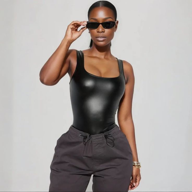 Get ready to show off your unique style with our faux leather square neck bodysuits! This contemporary piece is form fitting and bold enough to make you stand out from the crowd. Don't miss out on this edgy and versatile item! Leather Bodysuit, Loungewear Set, Black Bodysuit, Square Neck, Unique Style, How To Look Better, Sweater Dress, Lounge Wear, Faux Leather