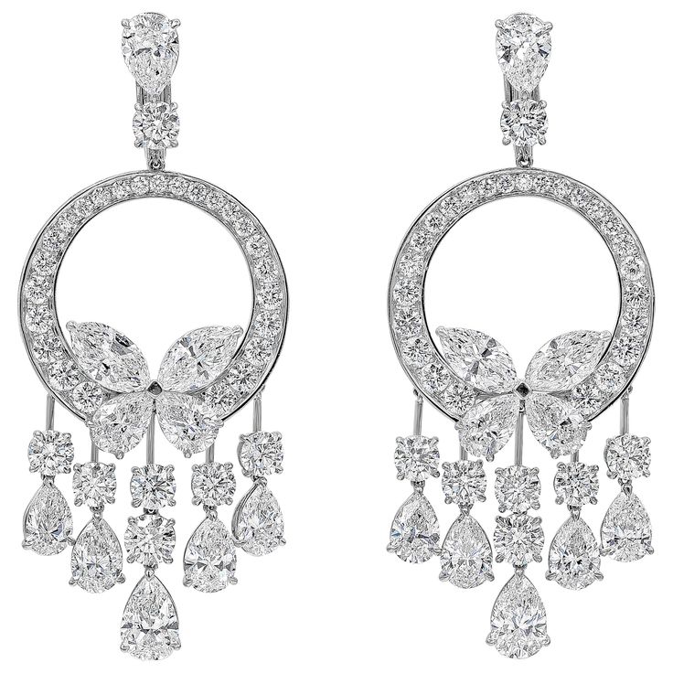 A well-crafted pair of dangle earrings, showcasing mixed-cut diamonds weighing 28.19 carats total, set in an open-work design. Accented by a butterfly motif made of pear and marquise shape diamonds and finished with pear and round shape diamond fringes. Comes with omega clips and collapsible posts. Finely made with platinum. Pearl Chandelier Earrings, Diamond Chandelier Earrings, Diamond Chandelier, Contemporary Engagement Rings, Butterfly Motif, Marquise Shape Diamond, Diamond Butterfly, Earrings Chandelier, Jewelry Showcases