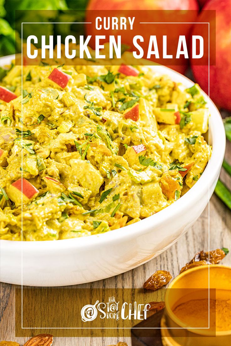 curry chicken salad in a white bowl on a wooden table