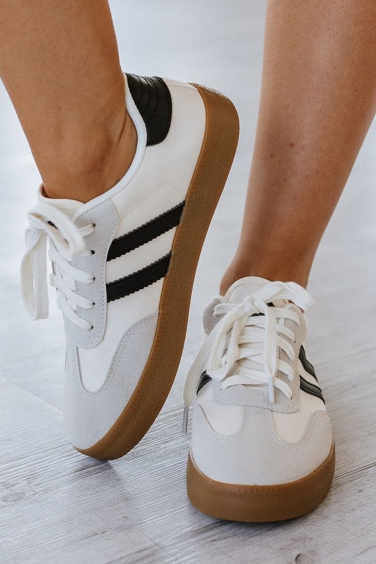 Stride in style with our Striped Lace Up Flat Sneakers! These trendy and comfortable sneakers feature a striped design and lace-up closure, perfect for adding a touch of flair to any outfit. You'll love the combination of fashion and functionality in these must-have shoes! Size Chart (INCH) Sizes Foot Length 6(37) 9.3 7(38) 9.4 8(39) 9.6 8.5(40) 9.8 9.5(41) 10.0 10(42) 10.2 Sporty White Canvas Shoes With Elastic Laces, Sporty Canvas Shoes With White Laces For Spring, Sporty Spring Canvas Shoes With White Laces, Sporty Lace-up Canvas Shoes, Sporty Lace-up Canvas Shoes With Elastic Laces, Sporty Canvas Shoes With Elastic Laces, Sporty Striped Low-top Sneakers, Striped Sporty Sneakers With Round Toe, Sporty Striped Sneakers With Round Toe