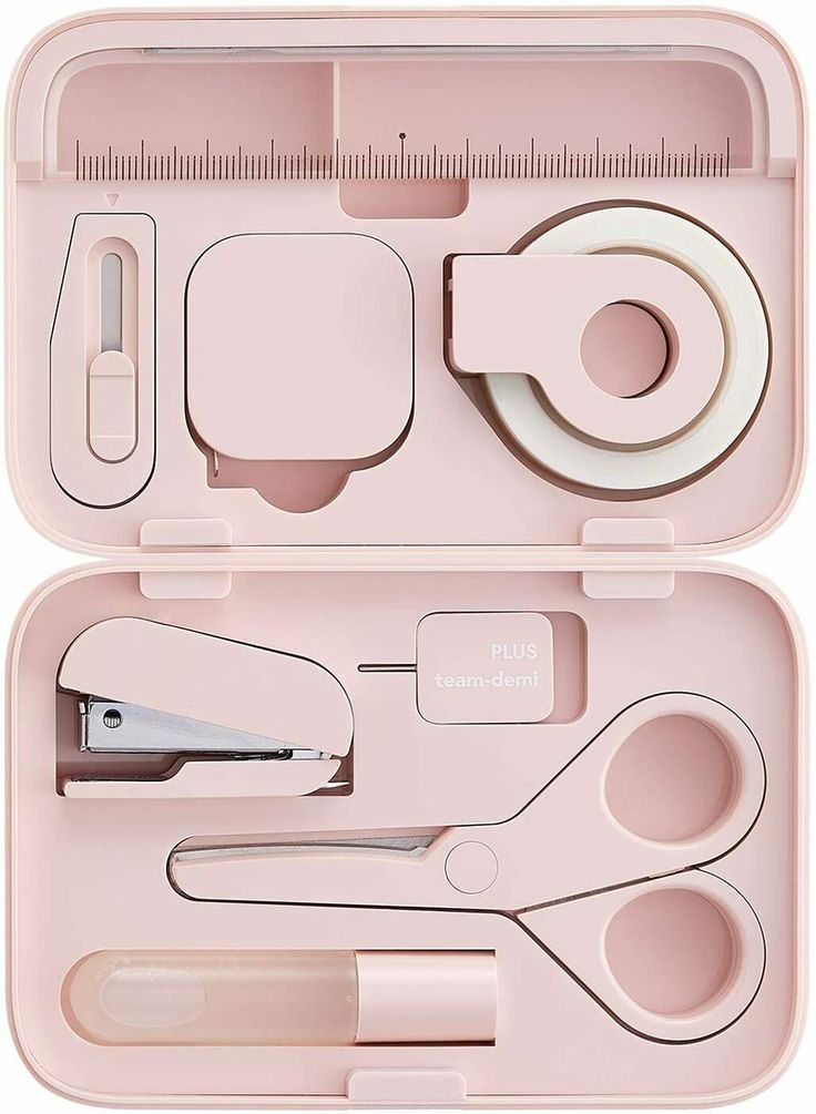 an open pink case with scissors, tape and other items