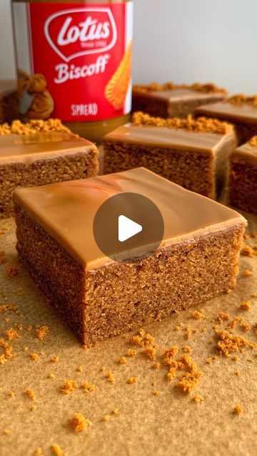 some brownies with peanut butter frosting on them and a can of biscuits in the background