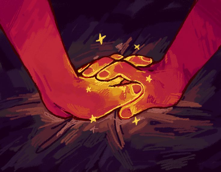 two hands holding each other with stars on them