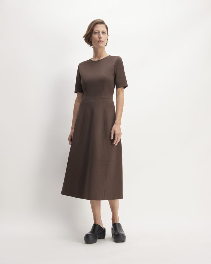 A dream of a dress. The answer to your dress dreams, meet the Dream Short-Sleeve Dress. Fitted in the bodice, it features a midi-length full skirt with seaming details, slim-fit sleeves that hit just above the elbow, and a center-back zipper. It’s made with our soft, double-knit Dream fabric, for that fits-like-a-dream effect. Easy to wear and simple to style, just add loafers for day, or heels or boots for evenings to give it an elevated edge. This dress is made with a blend of organic cott Casual Simple Dress, Extra Dresses, Water Recycling, Dress Fitted, Double Knitting, Full Skirt, The Dream, Simple Dresses, A Dream