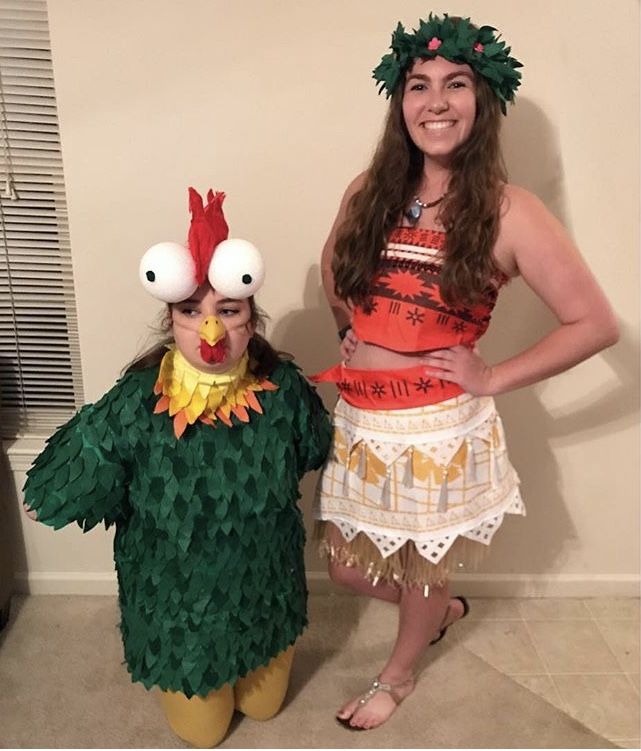 two people in costumes standing next to each other