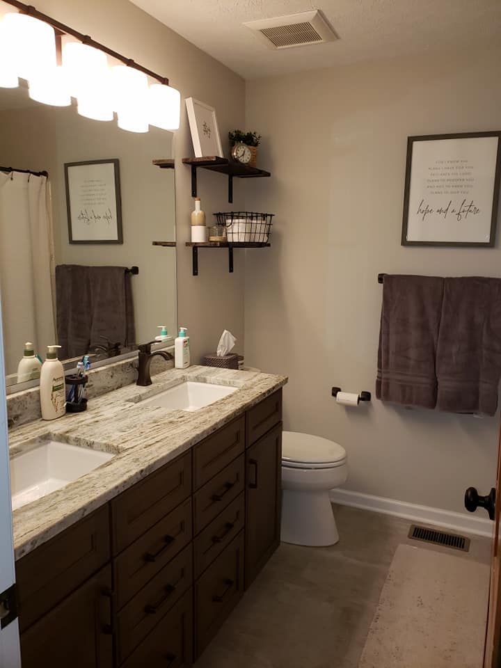 the bathroom is clean and ready for us to use it's new counter tops