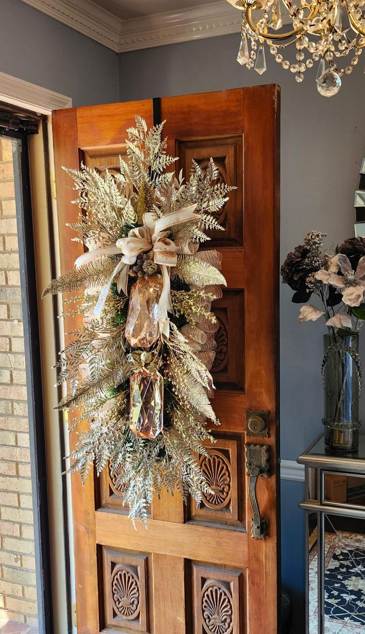 a wooden door with a wreath on it