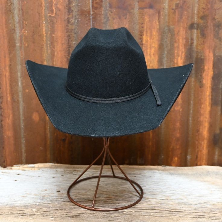 View of front of hat Black Western Hat For Outdoor, Black Wide Brim Hat For Ranch, Wide Brim Black Hat For Ranch, Classic Black Hat For Ranch, Black Western Style Brimmed Felt Hat, Black Western Felt Hat For Winter, Western Black Hat Band For Western-themed Events, Western Black Brimmed Felt Hat, Black Brimmed Western Felt Hat