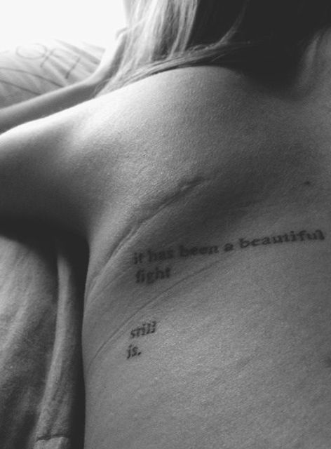 the back of a woman's left shoulder with an inscription that reads, what been a beautiful night?