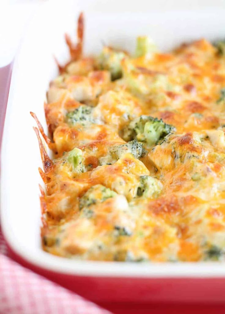 a casserole dish with broccoli and cheese