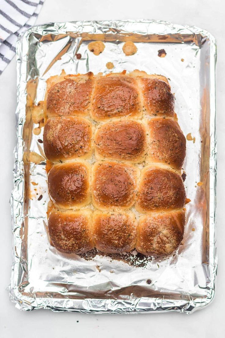 a loaf of bread sitting on top of aluminum foil