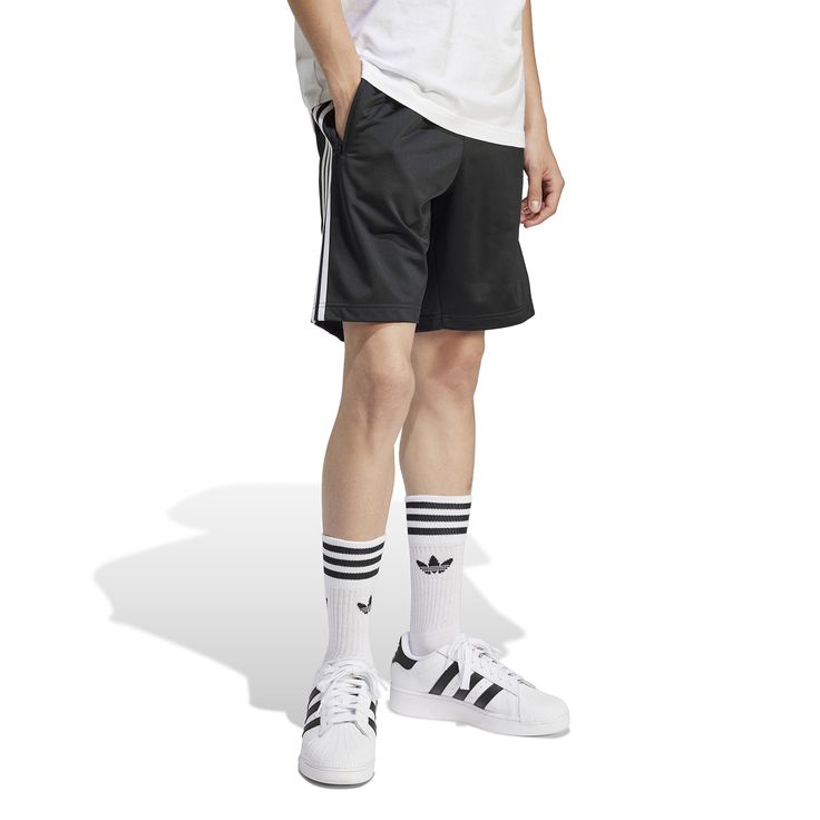 The shorts are on fire! The adidas Firebird Men's Shorts emulsify comfort and style, allowing you to wear them on the court, at the next family BBQ, or running errands around town. Not only will you show off you're a quality man with the trefoil logo, but you'll have the satisfaction of knowing you're wearing shorts that adidas made to last.Features: Elastic waistband. Features adidas trefoil logo on leg. Regular, relaxed fit. Details: Comes above knee on most men. Fabric: 100% recycled Polyeste Adidas Athletic Shorts With Three Stripes For Streetwear, Adidas Sporty Athletic Shorts For Summer, Adidas Three Stripes Athletic Shorts For Summer, Adidas Logo Sports Shorts For Spring, Adidas Athletic Shorts With Three Stripes For Summer, Adidas Logo Shorts For Sports In Spring, Adidas Summer Athletic Shorts With Three Stripes, Spring Sports Shorts With Adidas Logo, Casual Adidas Logo Shorts For Spring