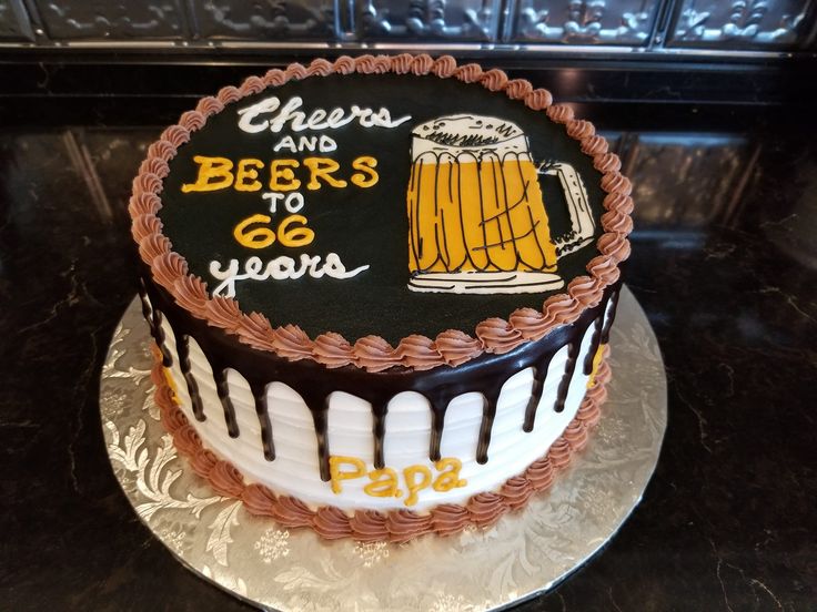 there is a cake that has been decorated with beer