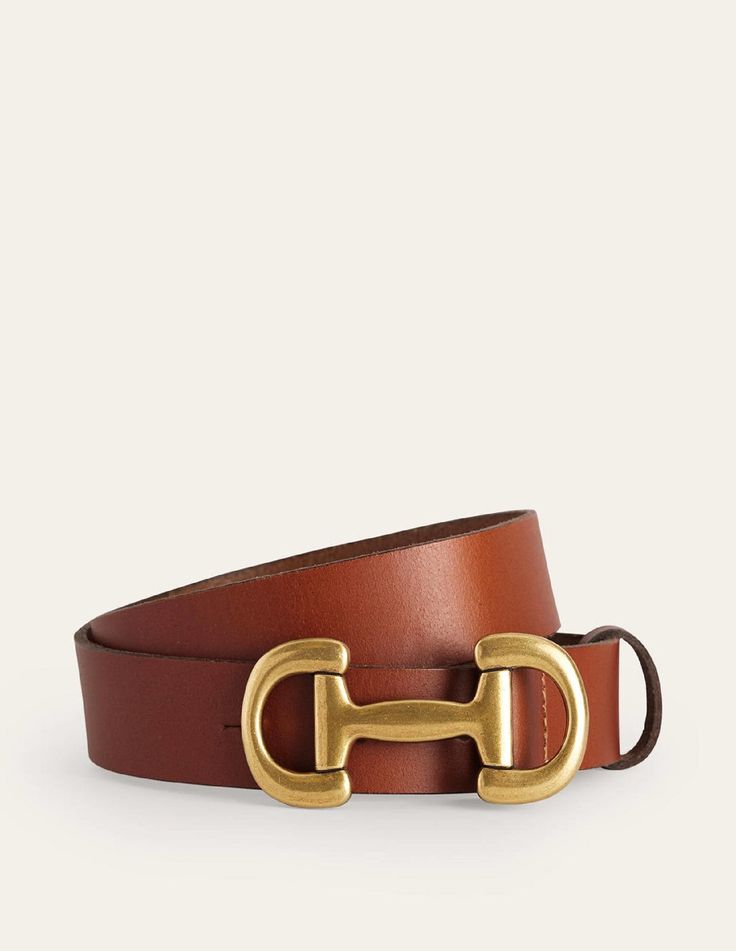 Adorned with gold-tone snaffle hardware, the Iris leather belt is an easy way to finish off all those outfits that just need ‘a little something’. Unique Belts, Iconic Accessories, Wardrobe Overhaul, Basic Accessories, Womens Belts, Tan Women, Tan Belt, Black Iris, Belt Brown