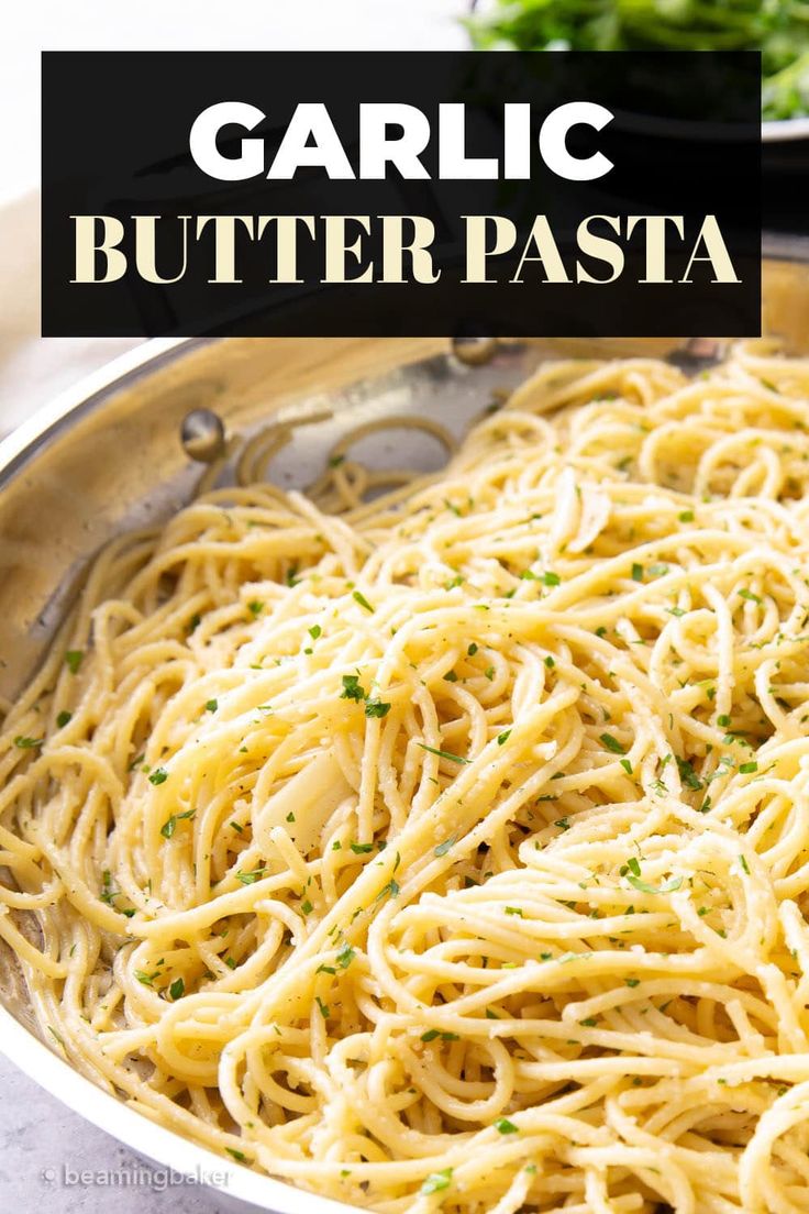 garlic butter pasta in a skillet with text overlay