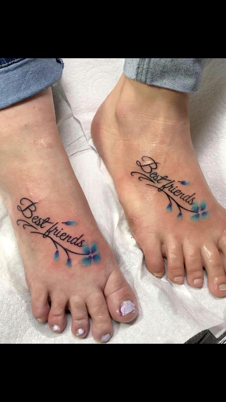 two feet with blue flowers and the words best friends on them