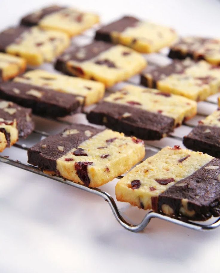 chocolate and raspberry shortbreads on a cooling rack ready to be eaten