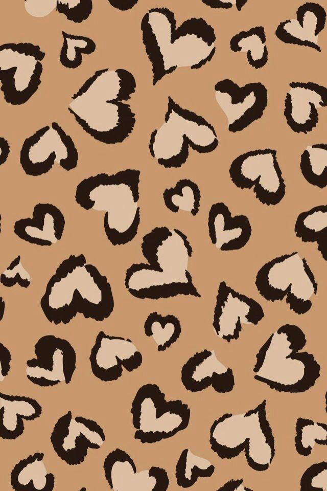 an animal print pattern with hearts