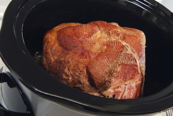 a large piece of meat is in the slow cooker