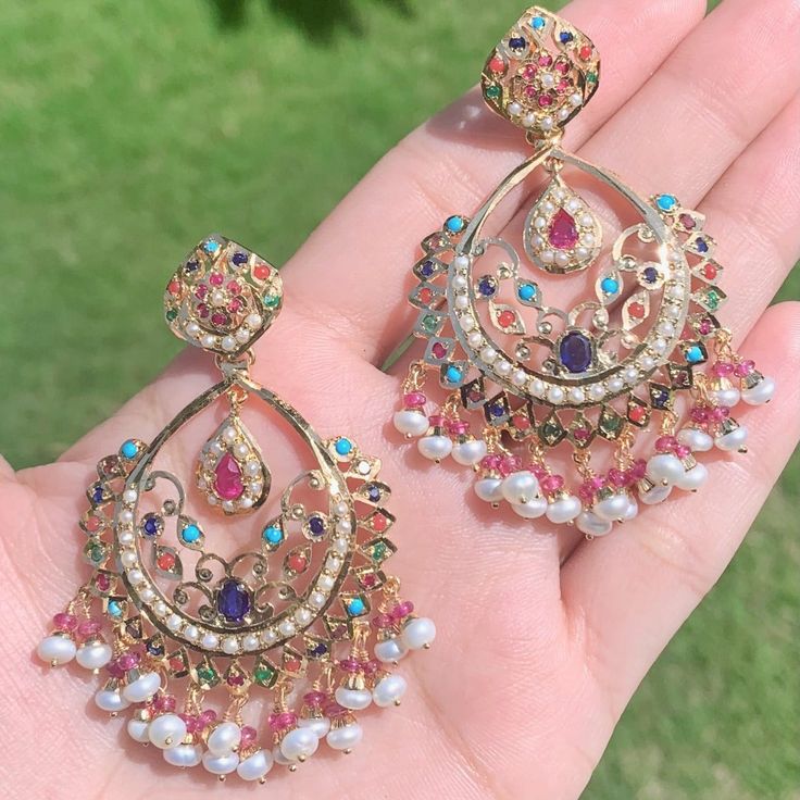 gold plated chandbalis Luxury Tilla Earrings For Navratri, Jeweled Chandbali Chandelier Earrings For Celebration, Multicolor Chandbali Earrings With Intricate Design, Celebration Jeweled Chandbali Chandelier Earrings, Multicolor Chandbali Chandelier Earrings, Jeweled Chandbali Temple Jewelry, Multicolor Chandbali Bridal Earrings With Intricate Design, Gold Jeweled Chandbali Pearl Earrings, Multicolor Intricate Chandbali Bridal Earrings