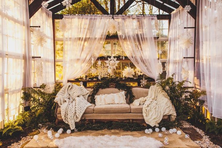 a living room filled with lots of furniture and decor