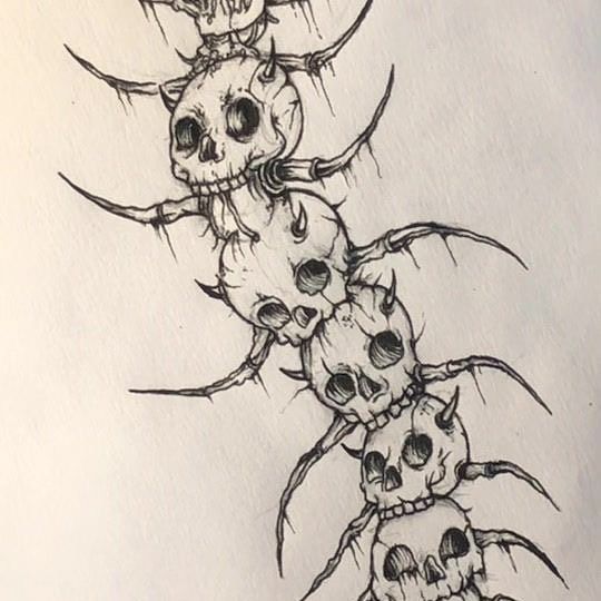 a drawing of skulls and bones on a sheet of paper