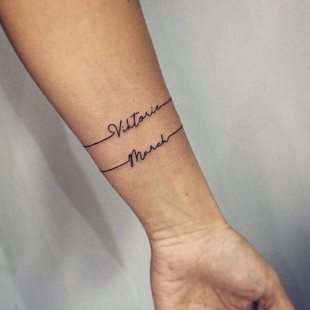 a woman's arm with the words written in cursive writing on it