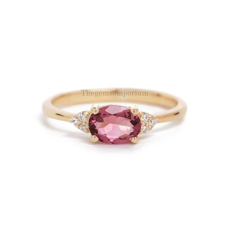 Direct Manufacturer/East West Pink Tourmaline Ring/Natural Diamond Accent/14k Rose Gold/October Birthstone/Gold Wedding Ring/Push Present CUSTOM/DUTY-FREE SHIPPING WORLDWIDE, BUYERS DON'T HAVE TO PAY ANY CUSTOM FEES WHILE IMPORTING Details Material: 14k/18k Gold Color Options: Yellow Gold, White Gold, Rose Gold ★ Center Stone Natural Pink Tourmaline, Oval Size: 5 x 7 mm Approx Weight (Ct): 0.75 ★ Accent Stones Natural Diamond Round Size: 1.2 mm * 6 Nos. Approx Weight (Ct): 0.048 ★ 100% Natural D Pink Tourmaline Rings With Gemstone Accents, Elegant Pink Tourmaline Birthstone Ring, Pink Tourmaline Birthstone Ring For Promise, Pink Tourmaline Sapphire Ring, Pink Tourmaline Birthstone Promise Ring, Pink Tourmaline Gemstone Rings, Pink Oval Ruby Ring With Gemstone Accents, Oval Pink Tourmaline Ruby Ring, Pink Tourmaline Birthstone Ring