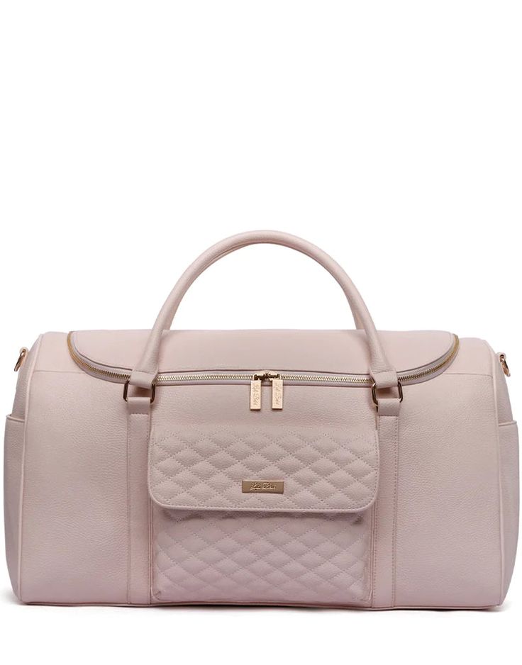 the pink leather duffel bag is shown with gold hardwares on the front and side