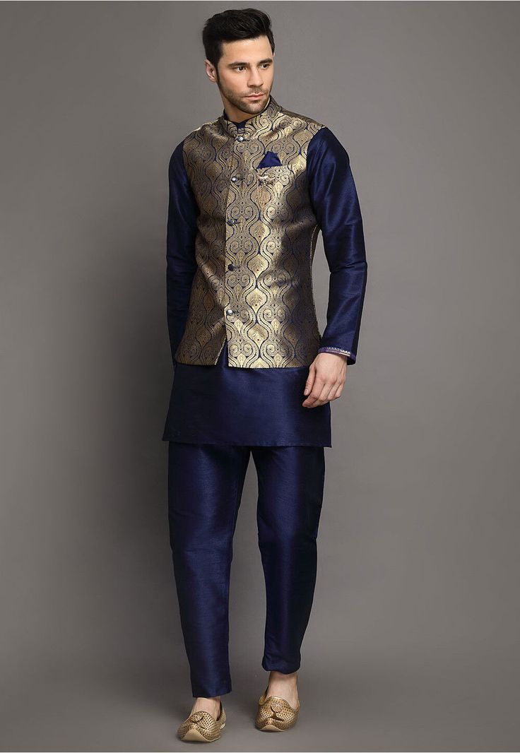 Art Silk Kurta in Navy Blue This Readymade attire is Enhanced with Buttons. Crafted in Chinese Collar Neck and Full Sleeve Available with an Art Silk Pajama in Navy Blue and an Art Brocade Silk Nehru Jacket in Navy Blue Do note: Brooch and Footwear shown in the image is for presentation purposes only. Half to one inch may vary in measurement. (Slight variation in actual color vs. image is possible) Festival Art Silk Blue Sherwani, Festive Blue Brocade Kurta, Festive Blue Silk Sherwani, Luxury Traditional Blue Nehru Jacket, Blue Traditional Nehru Jacket, Chinese Collar, Golden Dress, Party Mode, Utsav Fashion