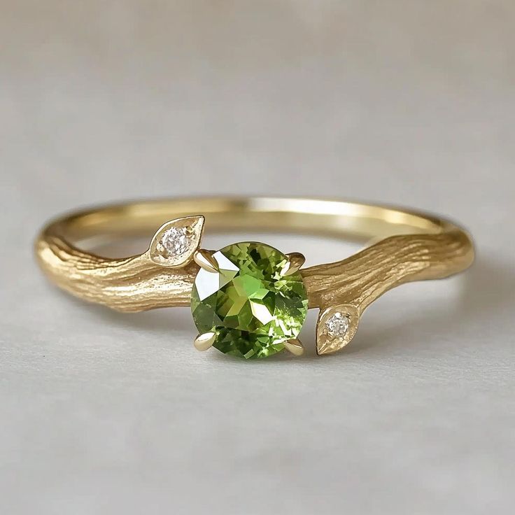 *Ethically Sourced Sapphire, crafted with care and conscience for the conscious wearer. Each piece is handcrafted with 10k/14k/18k gold / platinum / silver in your choice. *Gem: Green Peridot 5mm, Moissanite 1.5mm **PERIDOT The stone of compassion. Peridot is believed to bring good health, restful sleep and peace to relationships by balancing emotions and mind. This friendly bright green stone also has the uncanny ability to inspire eloquence and creativity, it also brings delight and good cheer Luxury Elegant Green Cluster Ring, Luxury Green Engraved Ring, Luxury Green Peridot Diamond Ring, Raw Peridot Ring, Luxury Peridot Birthstone Ring With Accent Stones, Luxury Peridot Three-stone Rings, Green Stone Wedding Ring, Engagement Rings Peridot, Peridot Engagement Rings Vintage