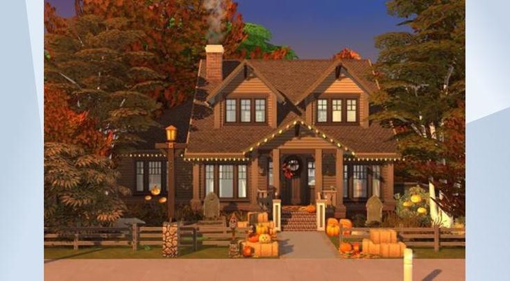 a large house with pumpkins in front of it and trees around the entrance area