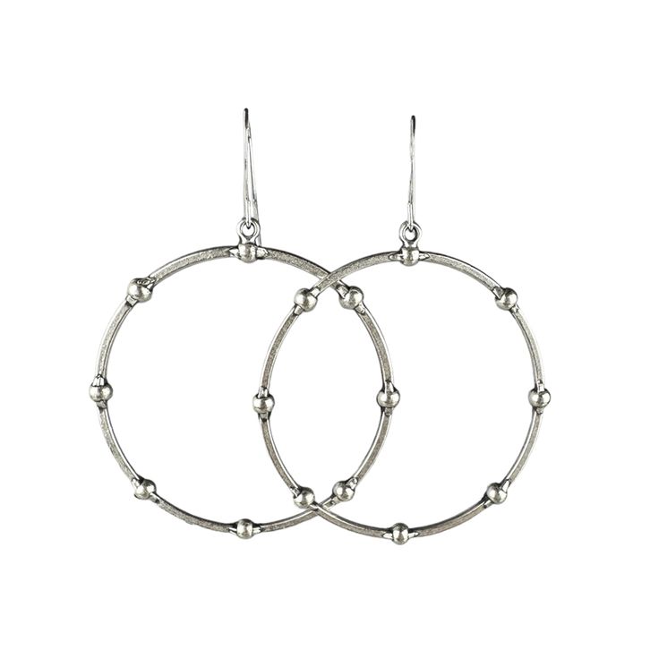 Elevate your style with our Silver Dot Hoops—crafted to blend rustic charm with a modern twist. These stunning earrings are a versatile addition to any jewelry collection, offering a unique design that effortlessly transitions from casual to chic. Made with premium materials, they're lightweight and easy to wear, ensuring you can enjoy their striking look all day long. The standout feature of these earrings is their hoop shape with polka dots around the perimeter. This design choice adds a touch Everyday Oxidized Finish Drop Earrings, Everyday Oxidized Drop Earrings, Everyday Metal Hoop Earrings With Oxidized Finish, Minimalist Oxidized Hoop Earrings, Modern Oxidized Hoop Earrings For Everyday, Modern Oxidized Finish Hoop Earrings For Everyday, Nickel Free Drop Earrings For Everyday Use, Everyday Small Hoop Earrings With Oxidized Finish, Modern Oxidized Finish Earrings For Everyday