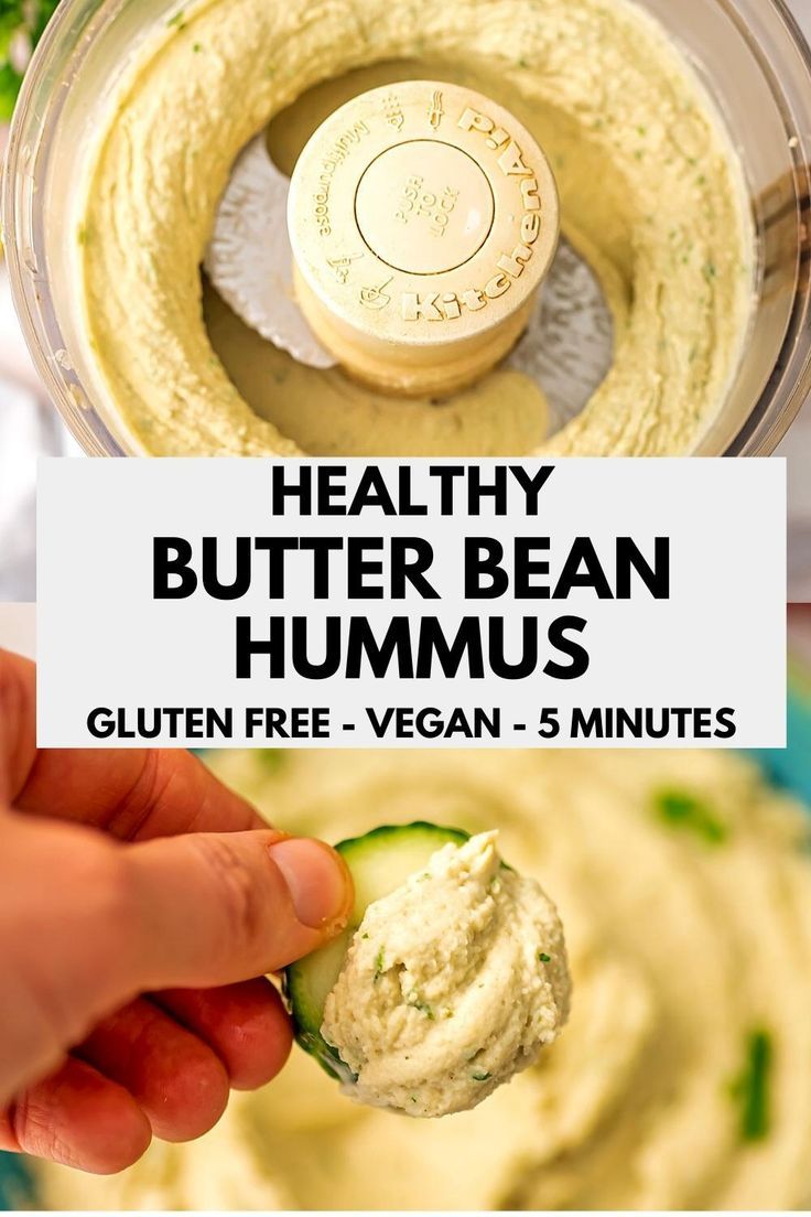 hummus being held up in a food processor with the text healthy butter bean hummus