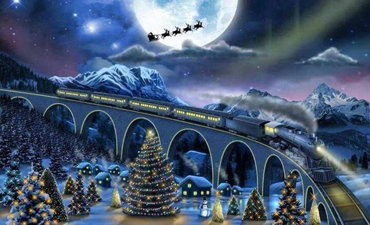 there is a train that is going over the bridge with christmas trees in front of it